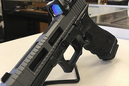 Glock 17 or 22 with ultralight slide cuts and RMR